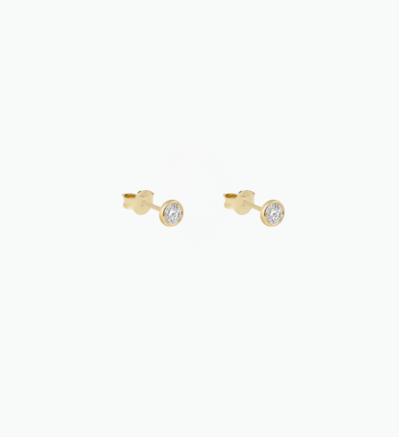 Gold diamond stud earrings with bezel-set white diamonds